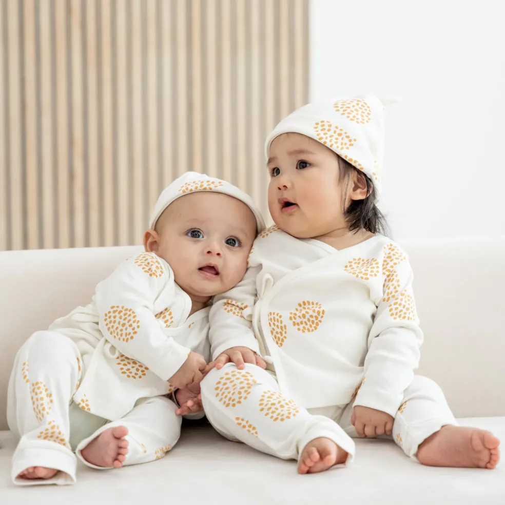 Motherswork x Le Petit Society Baby Organic Knotted Hat in Dandelion Print