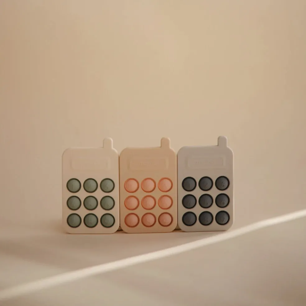 Mushie Phone Press Toy